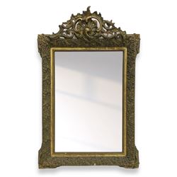 Victorian giltwood and gesso wall mirror, pierced shell cartouche pediment decorated with C-scrolls and curled leaves, moulded frame with curled acanthus leaf decoration and beaded inner slip, the corner brackets decorated with flower heads 