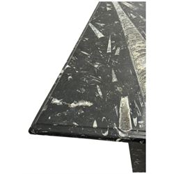 Marble hall table with orthoceras and goniatite inclusions, the rectangular top upon two rectangular stepped plinths, H78cm, L135cm, D77cm