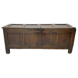 17th century panelled oak blanket chest or kist, quadruple panelled hinged lid over quadruple panelled front, moulded frame and pegged construction, on stile supports