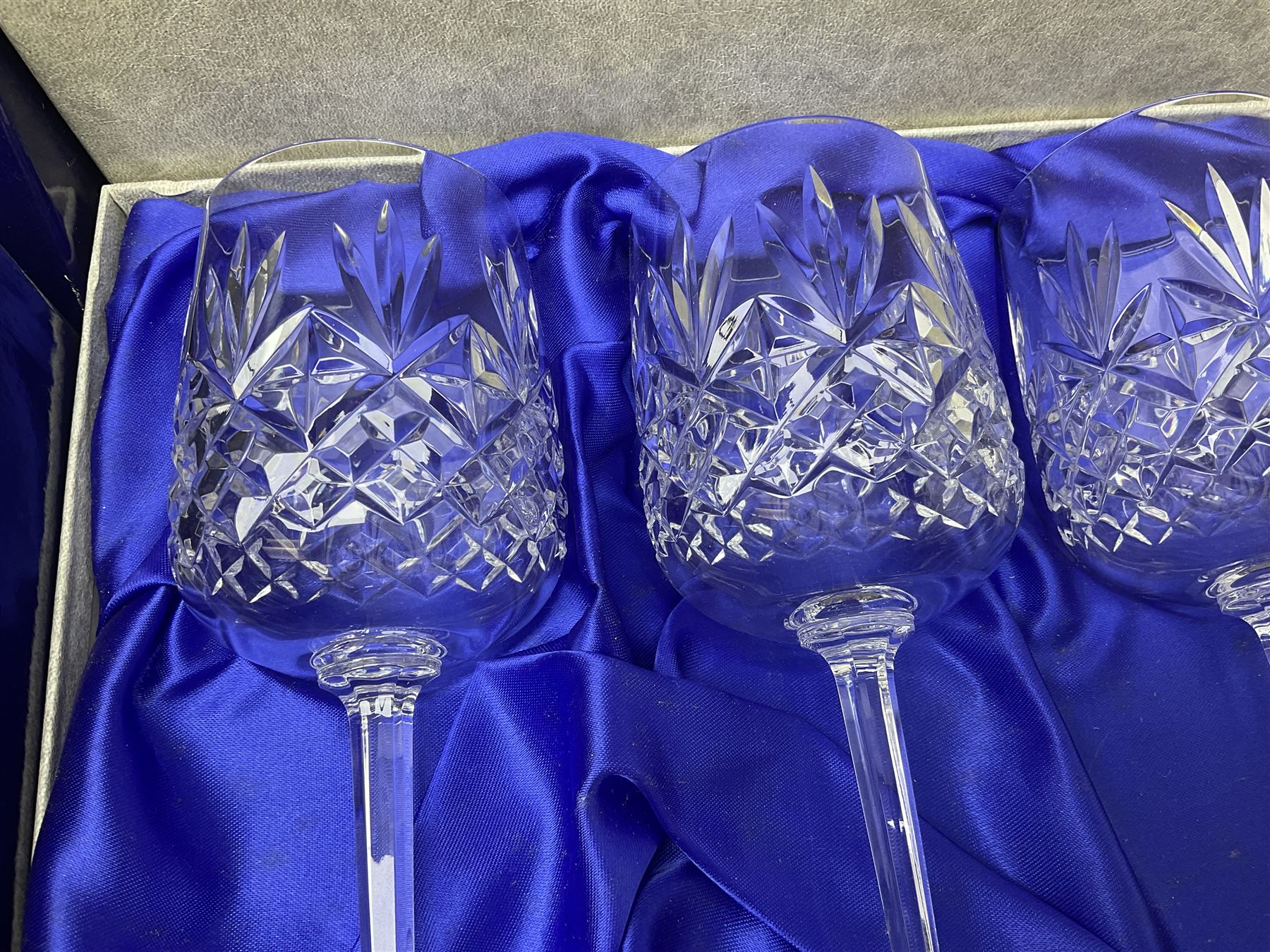 Set of six Edinburgh Crystal Continental Collection wine glasses, together with a set of six Edinburgh Crystal brandy glasses, both boxed