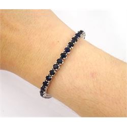 18ct white gold round cut sapphire bracelet, hallmarked, total sapphire weight approx 8.00 carat