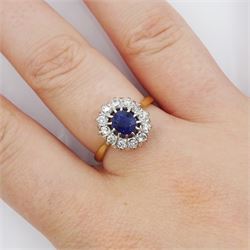 Gold oval cut sapphire and round brilliant cut diamond cluster ring, stamped 18ct Plat, sapphire approx 0.85 carat, total diamond weight approx 0.35 carat