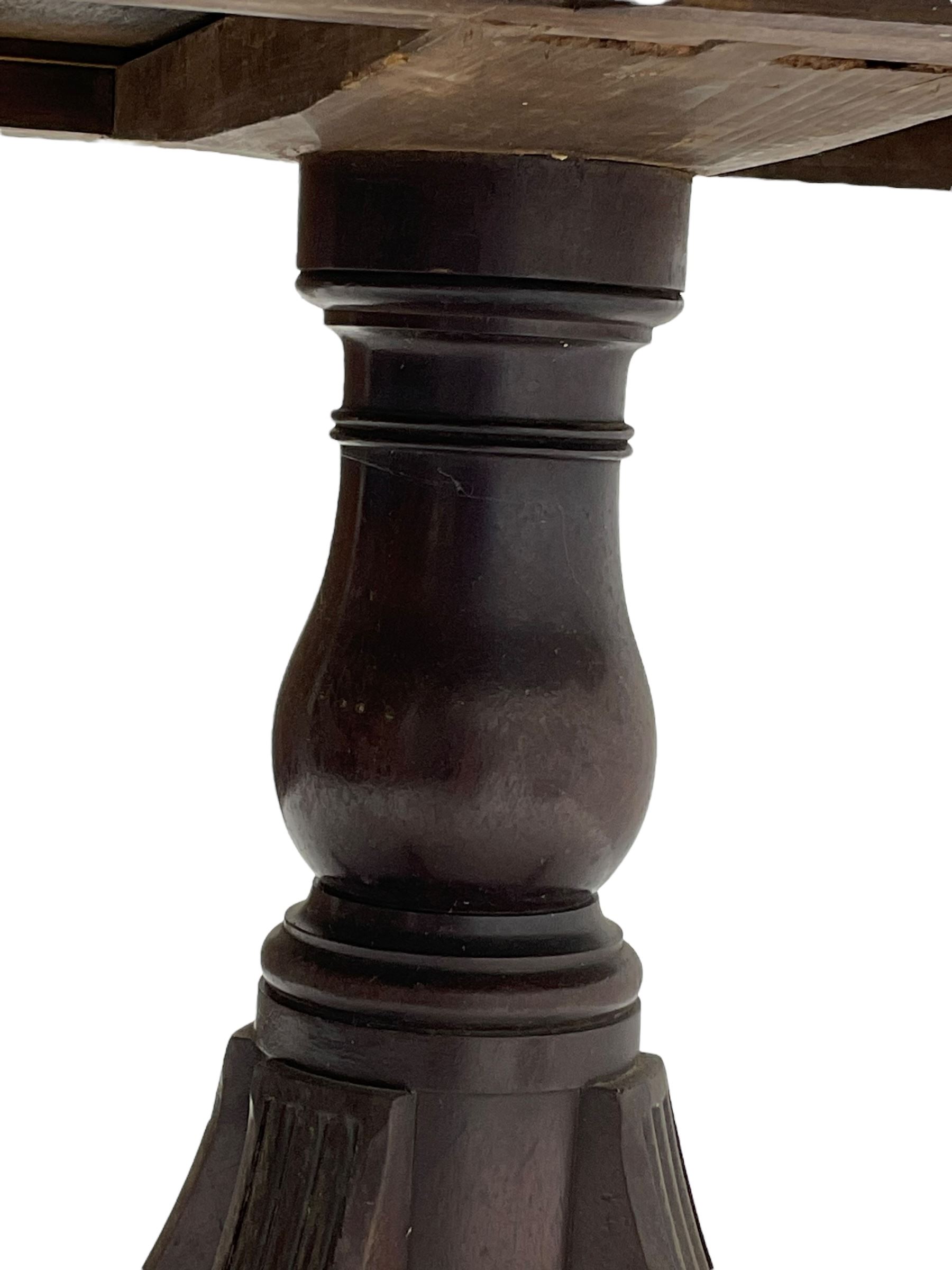 George III mahogany Pembroke table, moulded rectangular drop-leaf top with rounded corners, fitted with single cock-beaded end drawer, on turned pedestal with four reed moulded supports, brass cups and castors 