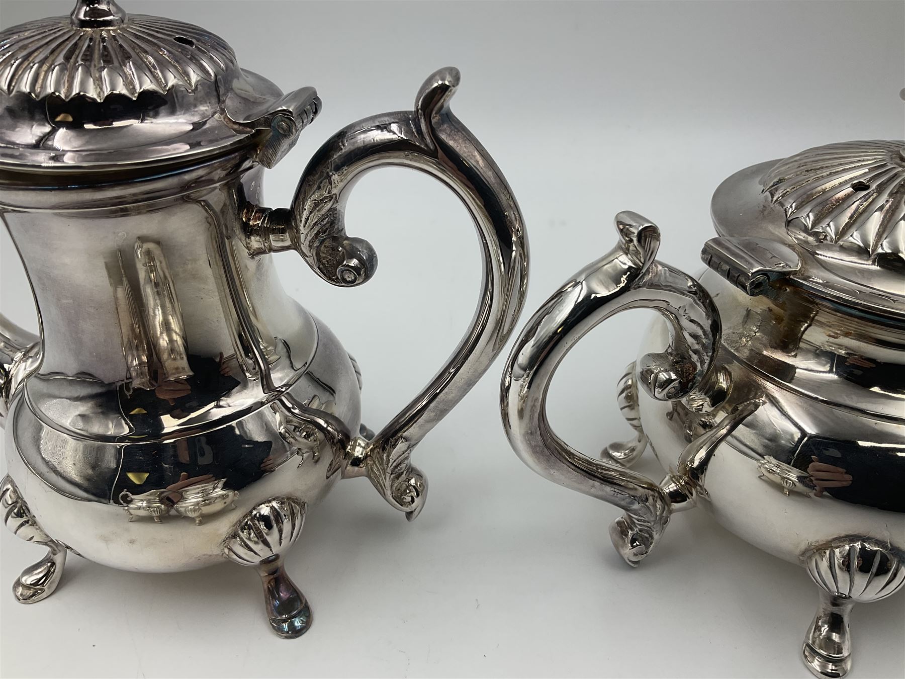 Miniature silver plated four piece tea service, comprising coffee pot, teapot, milk jug and sugar bowl, stamped GRC EPNS beneath, coffee pot H16cm