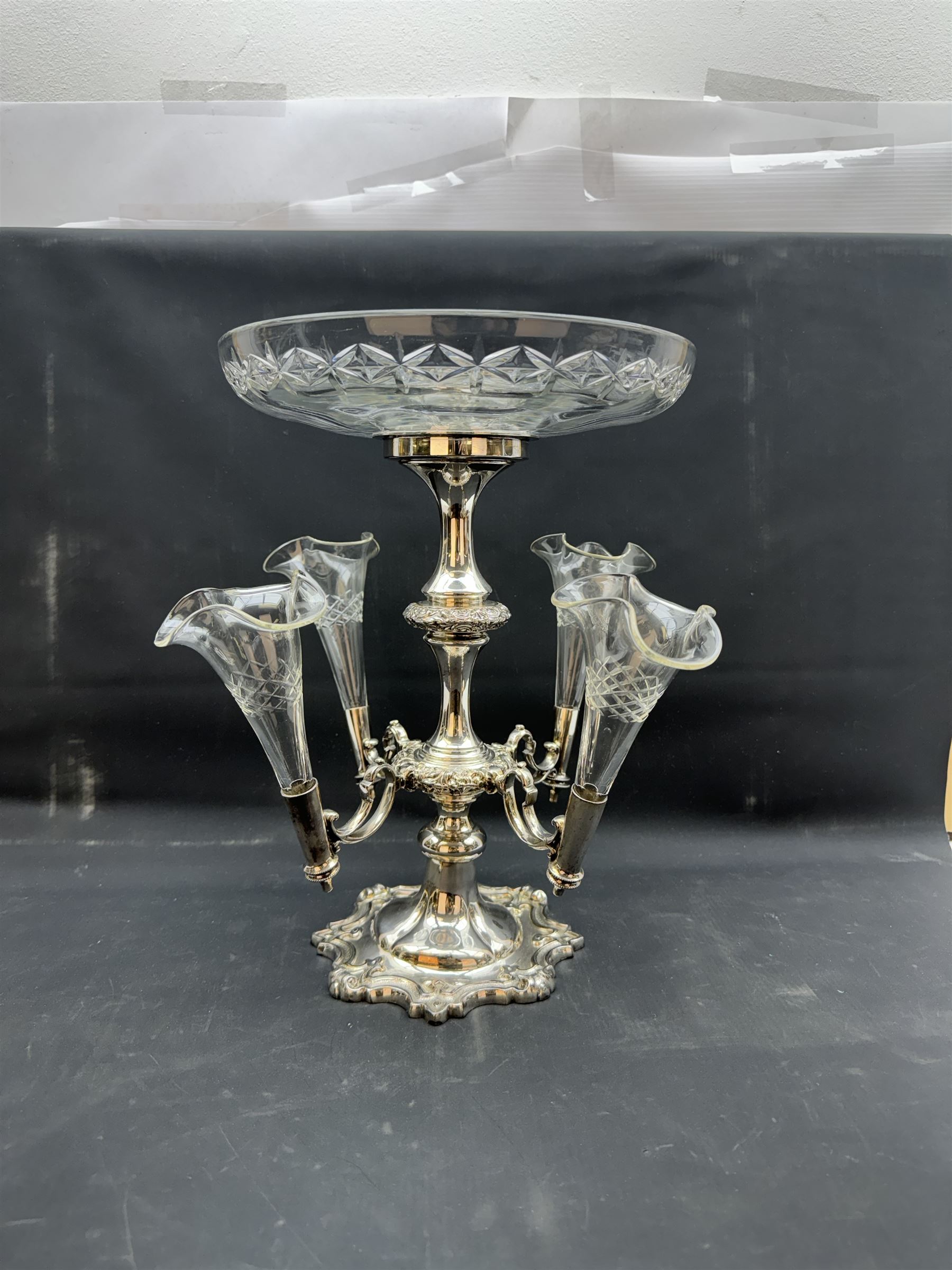 Walker & Hall Sheffield silver plated epergne and a pair of plated candle sticks, epergne H35cm