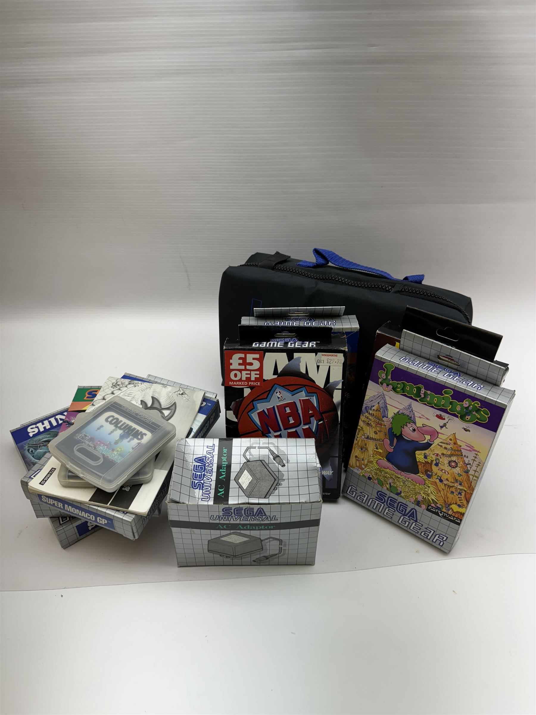 Sega Game Gear handheld console, in Logic 3 case, together with nine Sega Game Gear games including Sonic The Hedgehog, Columns, Super Monaco GP, Shinobi, Streets of Rage, Mortal Kombat, Lemmings etc, seven with original boxes, and an AC adapter