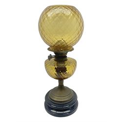 Victorian oil lamp, the glass reservoir upon brass stem and stepped circular base, with glass shade