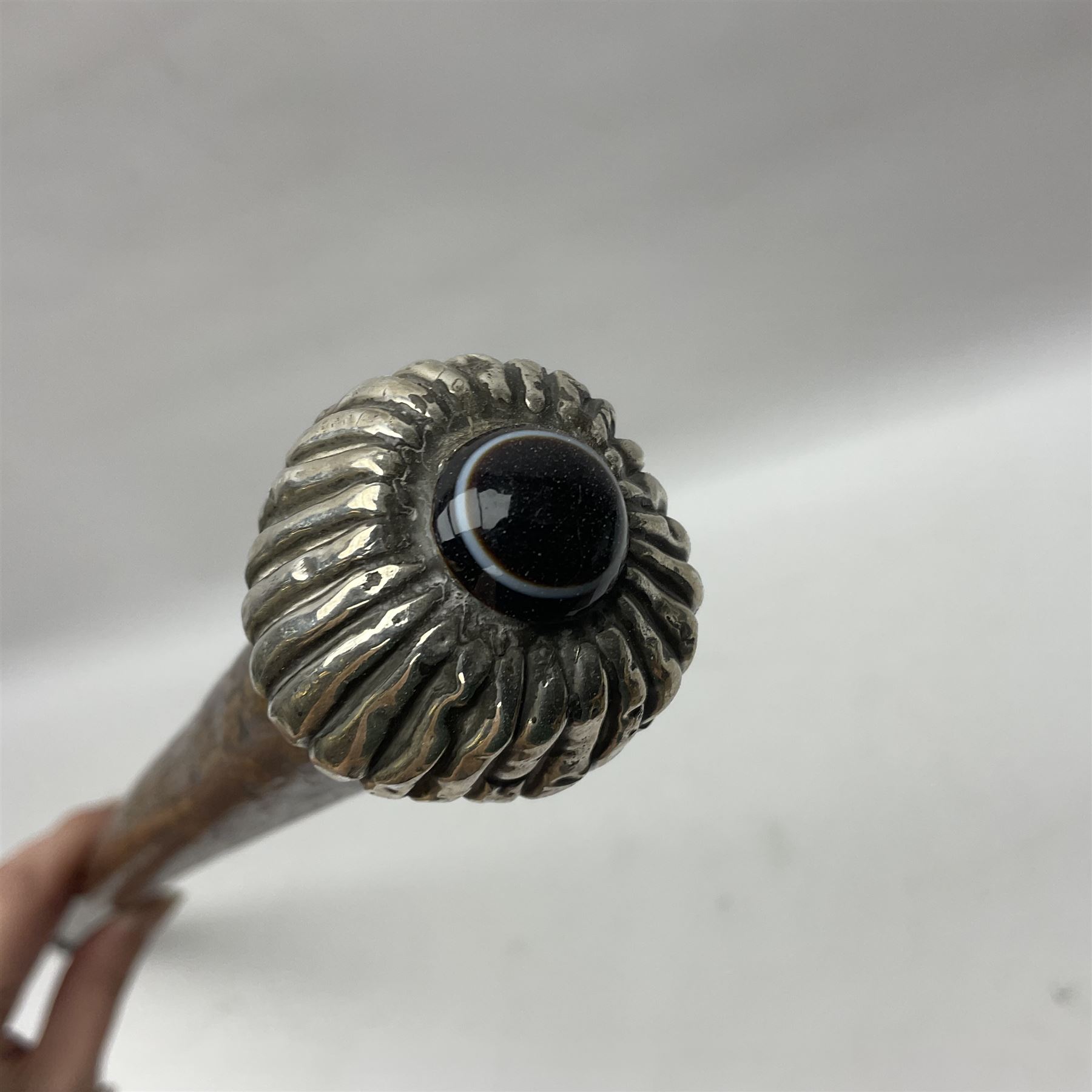 Victorian walking stick, the fluted silver pommel set with banded agate, hallmarked London 1892, maker's mark indistinct, L84cm